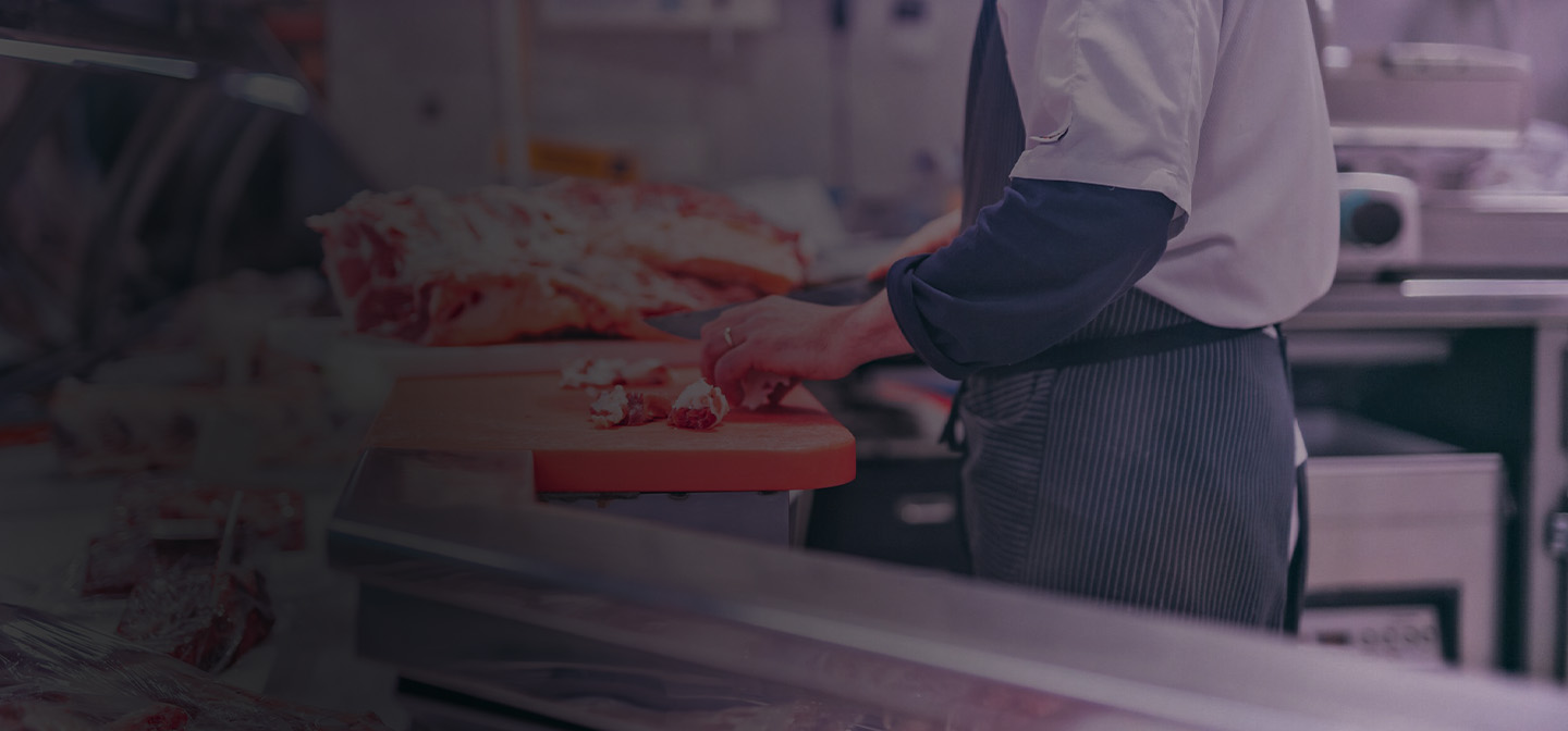 Butcher Chopping Meat