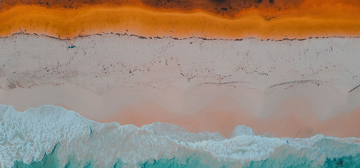 November 2024 electricity market review header - beach